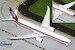 Boeing 777-300ER Qatar Airways A7-BAC 25th Anniversary retro livery flaps down 