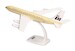 Boeing 707-300 Braniff solid beige N7095  614023
