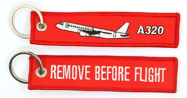 Keyholder with `Remove Before Flight ` on one side and `A320' and silhouette on other side RBF-A320