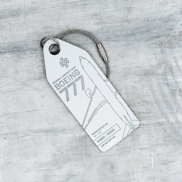 Keychain made of real aircraft skin: Boeing 777 HS-TJF Thai Airways (white) HS-TJF WHITE