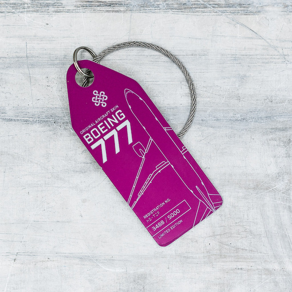 Keychain made of real aircraft skin: Boeing 777 HS-TJF Thai Airways (pink) HS-TJF PINK