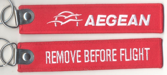 Keyholder with AEGEAN on one side and Remove Before Flight on back side RBF-AEGEAN