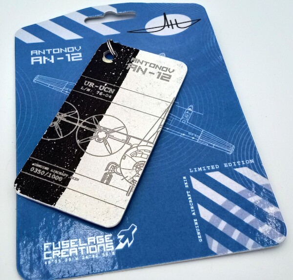 Keychain made of real aircraft skin: Antonov An12 Ukrainian Cargo Airways UR-UCN white/black 10005057