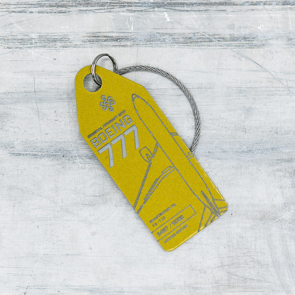 Keychain made of real aircraft skin: Boeing 777 HS-TJF Thai Airways (gold) HS-TJF GOLD