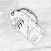 Keychain made of real aircraft skin: Boeing 777 Etihad A6-LRB pearl  A6-LRB-PEARL image 1