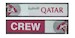 Keyholder with Qatar on one side and (Qatar) crew on other side