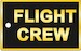 Bagagetag with FLIGHT CREW in gold on black underground on one side and writable backside, including metal wire