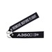 Keyholder (black) with `Remove Before Flight ` on one side and `A350XWB' on other side