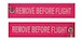 Keyholder with REMOVE BEFORE FLIGHT on both sides - pink background