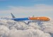 KLM Orange Pride Boeing 777-300 in flight Poster POS-ORANGE